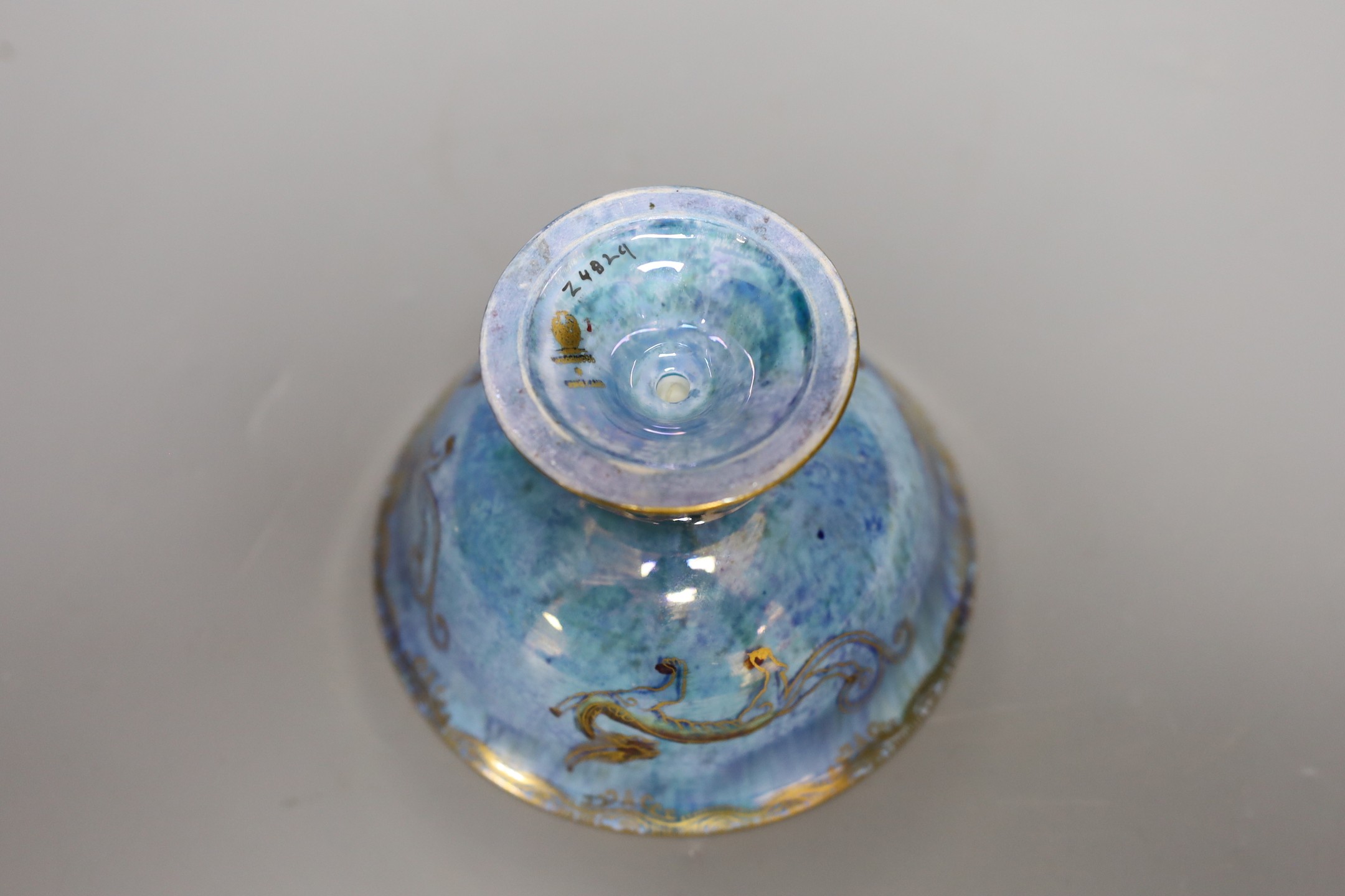 A Wedgwood blue lustre chinoiserie pedestal bowl, designed by Daisy Makeig Jones, pattern number Z4829, 8 cms high